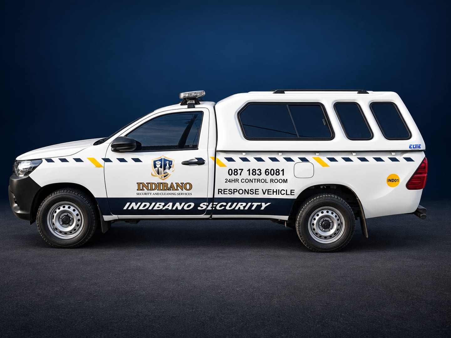 Indibano-branded Toyota bakkie against a retouched navy background.