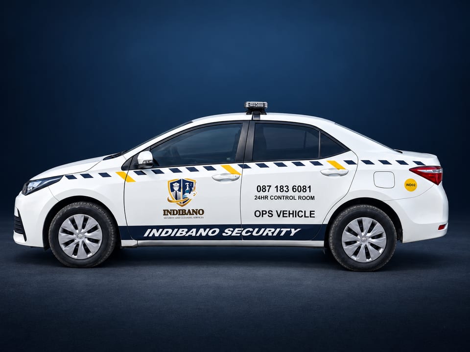 Indibano-branded Toyota sedan against a retouched navy background.